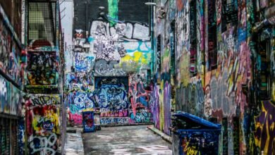 graffiti wall alley during daytime