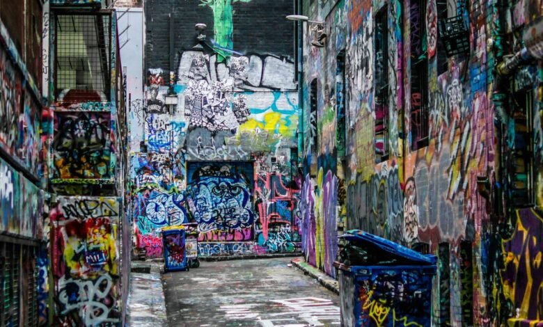 graffiti wall alley during daytime
